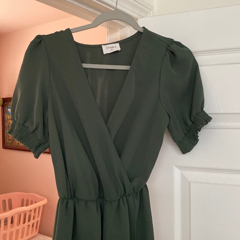 Everly green dress. Slightly worn with small stain. Hardly noticeable.